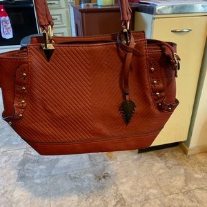 Purses. Just trying to clean out the clutter